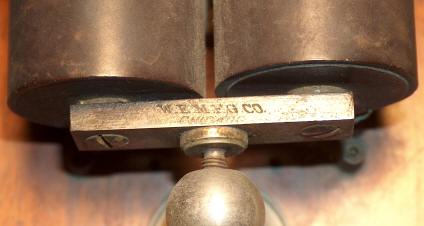 W.E. Mfg. Co. logo on Relay yoke